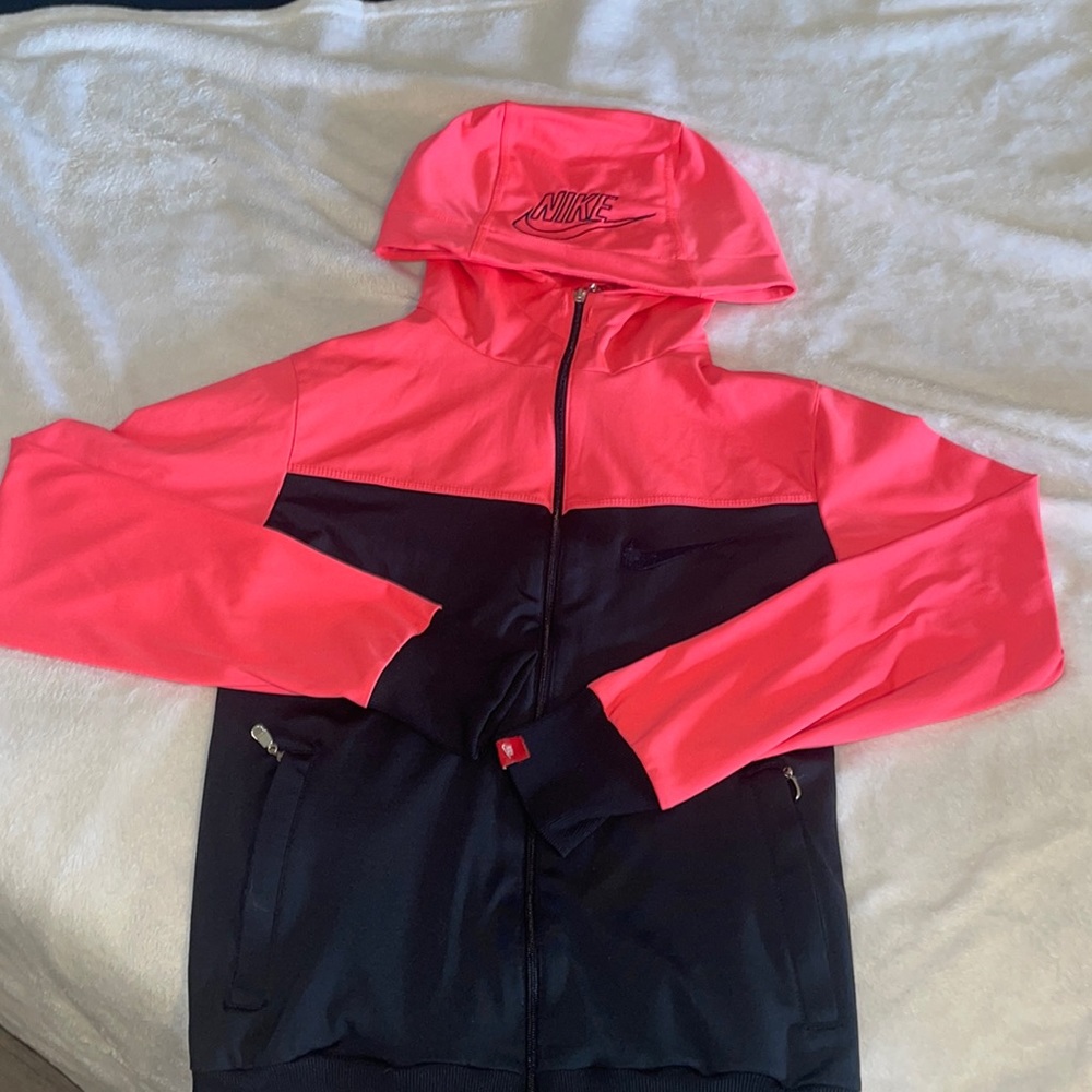 Nike neon pink and navy blue hooded jacket. Size children’s L but fits women’s S